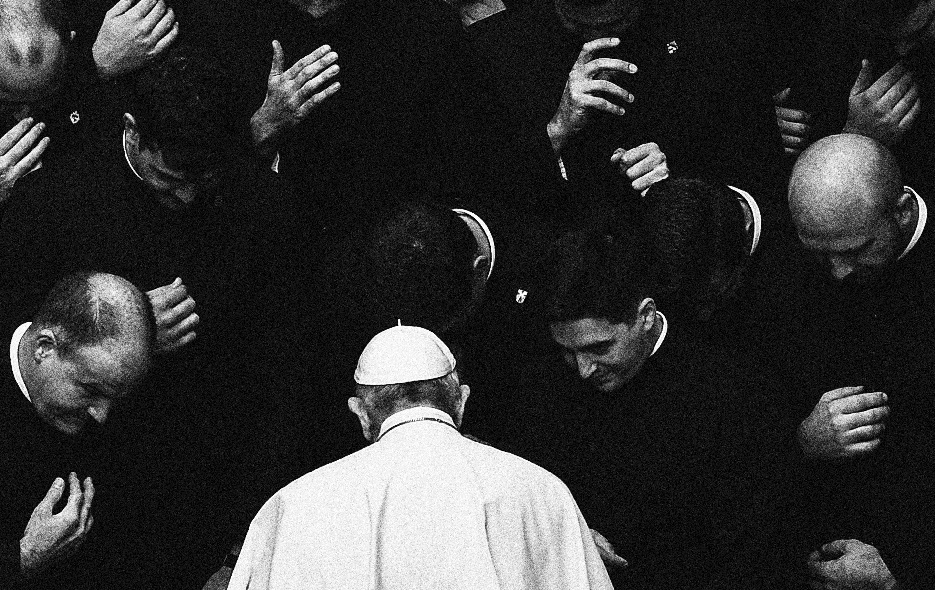 Pope Francis prays with priests at the end of a limited public audience at the San Damaso courtyard in The Vatican on September 30, 2020, during the COVID-19 infection, caused by the novel coronavirus. (Photo by FILIPPO MONTEFORTE/AFP via Getty Images)
