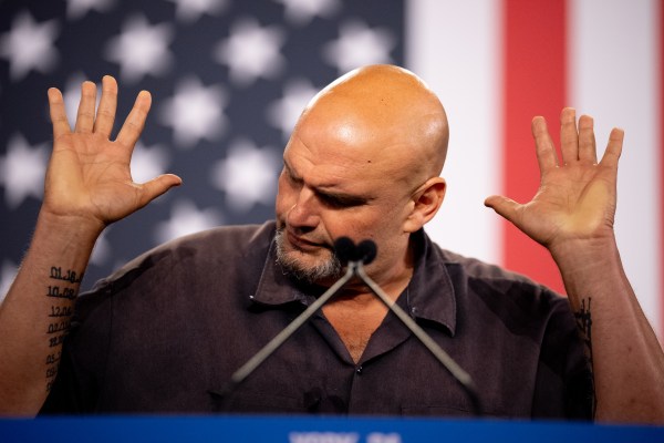 Sen. John Fetterman of Pennsylvania gestures while speaking at a rally for Democratic vice presidential nominee Minnesota Gov. Tim Walz at York Exposition Center UPMC Arena on October 2, 2024 in York, Pennsylvania. (Photo by Andrew Harnik/Getty Images)