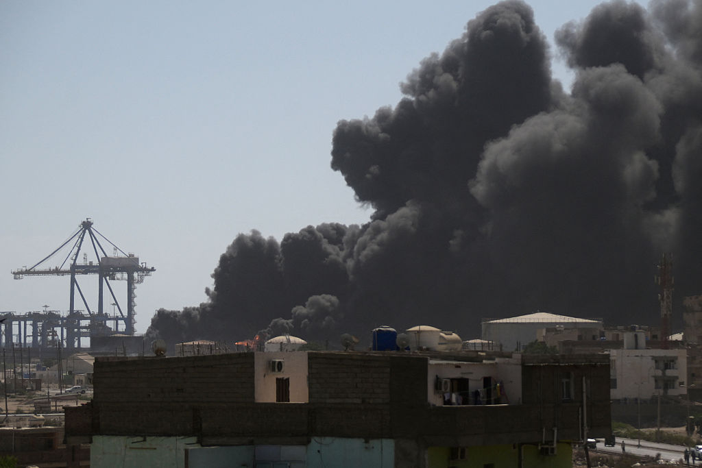Smoke billows after a drone strike on the port of Port Sudan on May 6, 2025. (Photo by AFP via Getty Images)