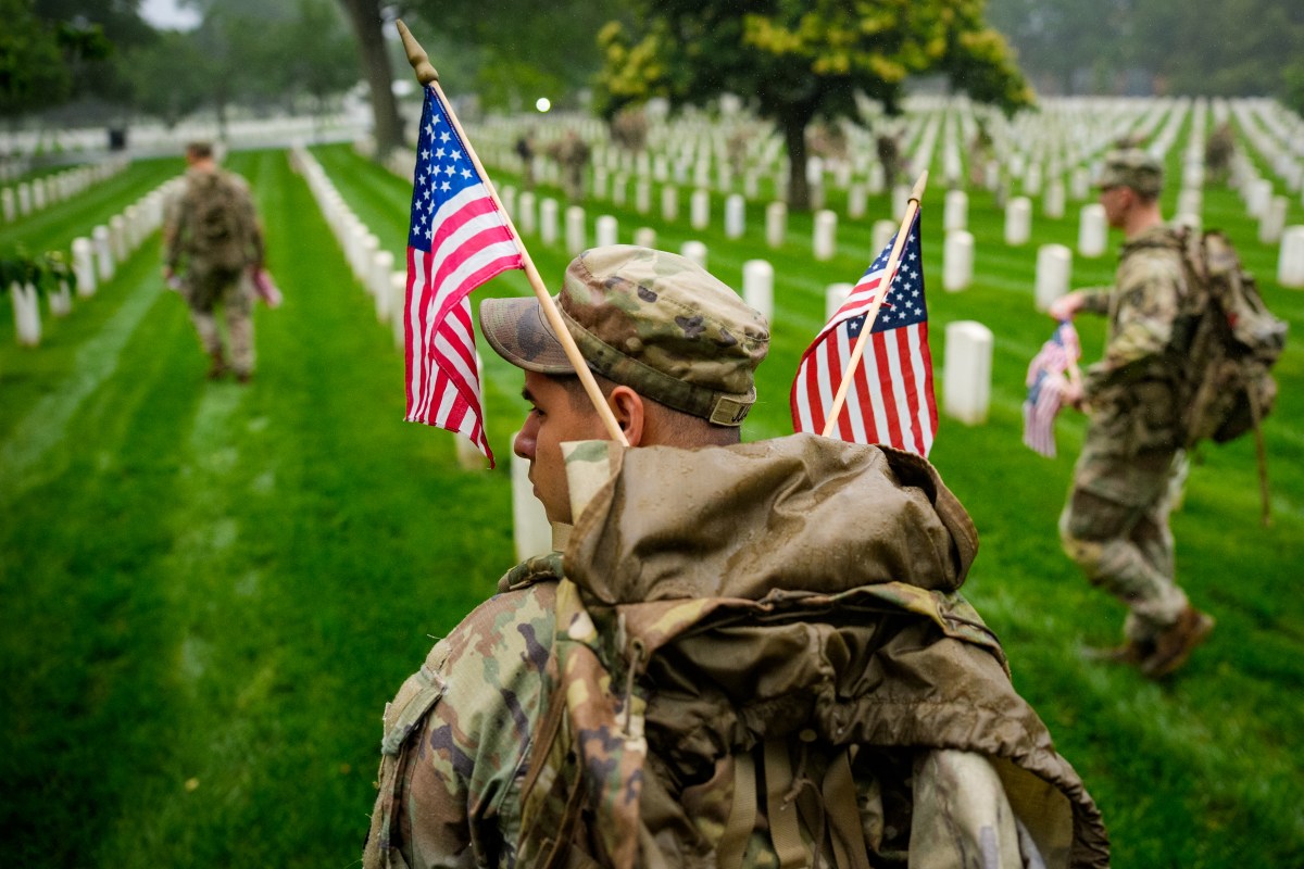 Flags In Takes Place At Arlington National Cemetery Ahead Of Memorial Day