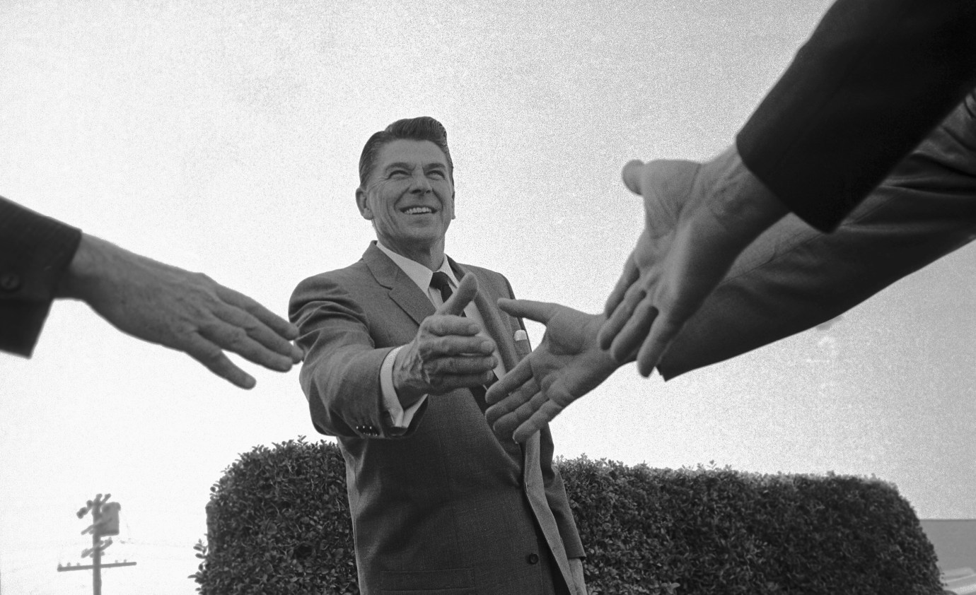 Ronald Reagan shakes hands with supporters while campaigning for governor of California. (Photo via Getty Images)