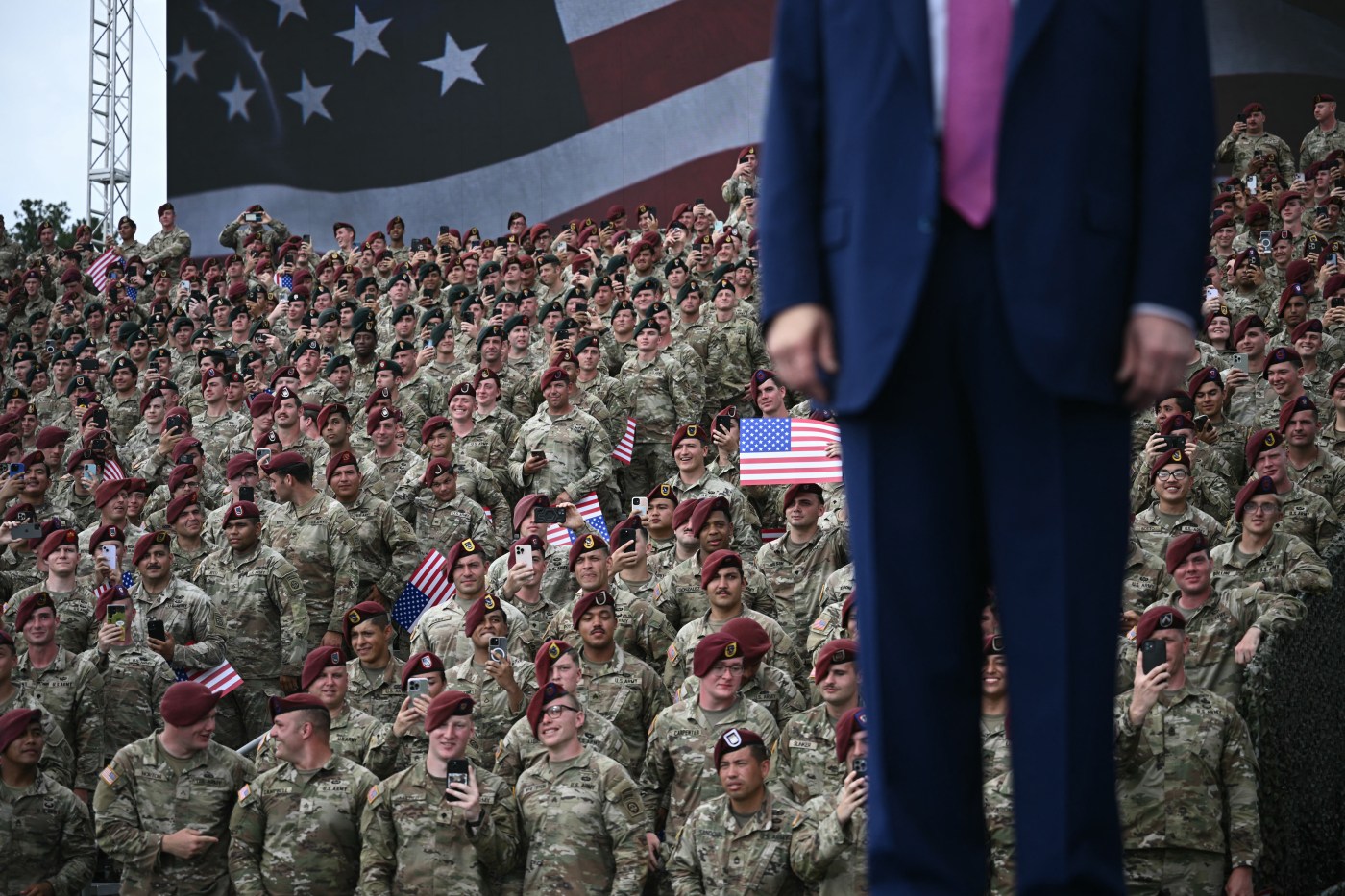 Members of the Army look on as US President Donald Trump arrives to speak at Fort Bragg, a US Army military installation, near Fayetteville, North Carolina, on June 10, 2025. (Photo by Brendan SMIALOWSKI / AFP) (Photo by BRENDAN SMIALOWSKI/AFP via Getty Images)
