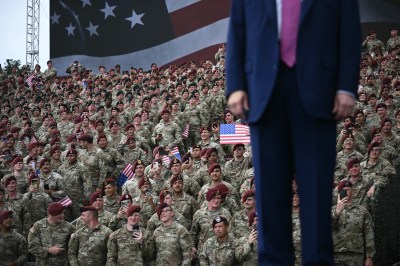 Members of the Army look on as US President Donald Trump arrives to speak at Fort Bragg, a US Army military installation, near Fayetteville, North Carolina, on June 10, 2025. (Photo by Brendan SMIALOWSKI / AFP) (Photo by BRENDAN SMIALOWSKI/AFP via Getty Images)