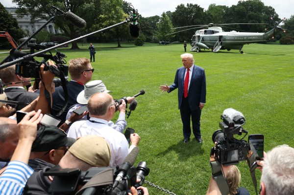 President Donald Trump speaks to the media as he arrives at the White House on June 9, 2025, in Washington, D.C. (Photo by Win McNamee/Getty Images)