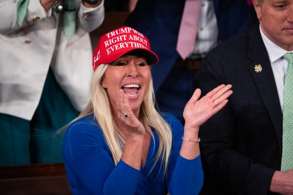 Rep. Marjorie Taylor Greene cheers during President Donald Trump's address to a joint session of Congress in the House Chamber of the U.S. Capitol on Tuesday, March 4, 2025. (Tom Williams/CQ-Roll Call, Inc via Getty Images)