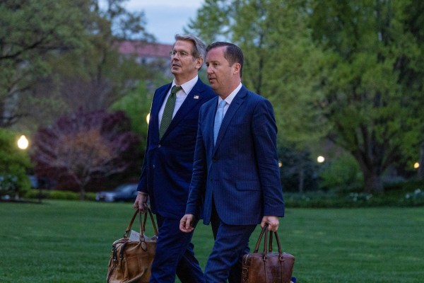 Treasury Secretary Scott Bessent and Sergio Gor, assistant to President Donald Trump and director of the Presidential Personnel Office, walk on the south lawn of the White House on April 6, 2025. (Photo by Tasos Katopodis/Getty Images)