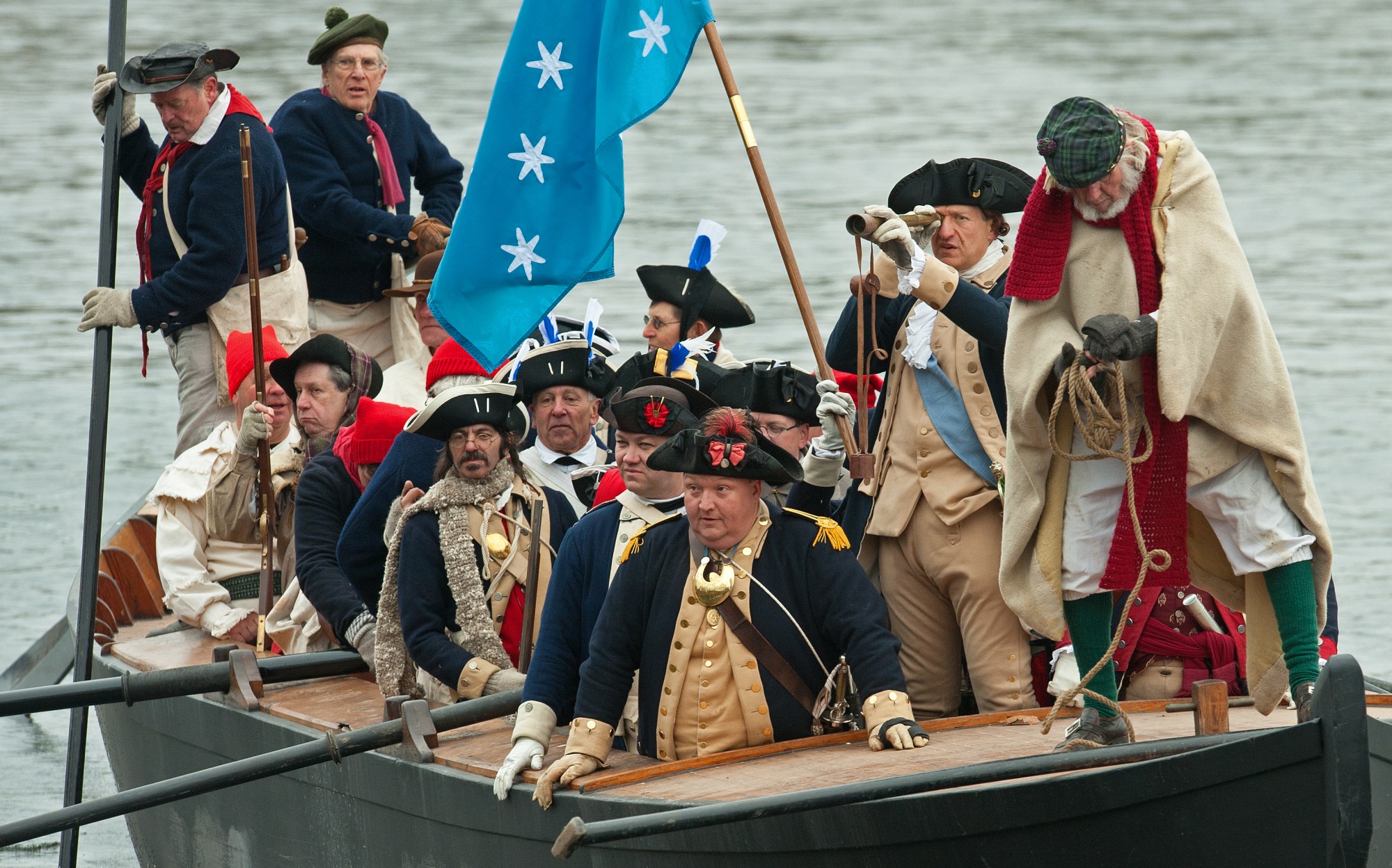 John Godzieba, holding the looking glass