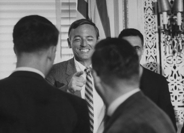 William F. Buckley Jr. talking with reporters at the National Press Club in 1965. (Photo by Truman Moore/Getty Images)
