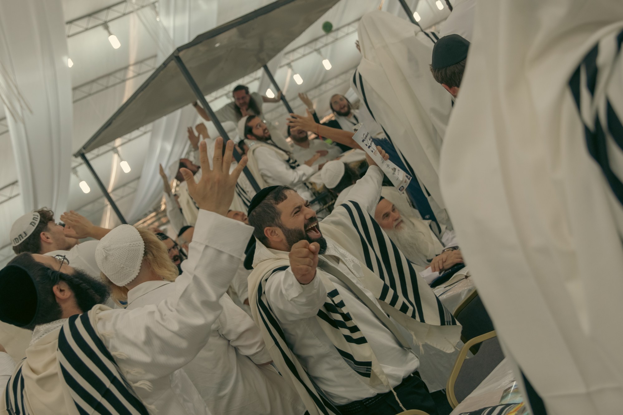 Worshippers rejoice in song and prayer during Rosh Hashanah celebrations in Uman, Ukraine. (Photo by Louis Lemaire-Sicre/The Dispatch).