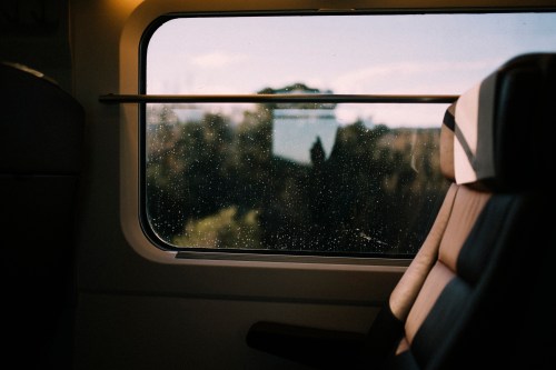 Window train views with rain and light reflects