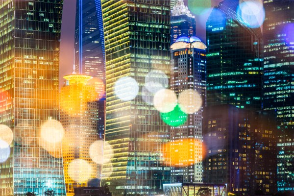 Bokeh image of modern skyscrapers at night, Shanghai, China.