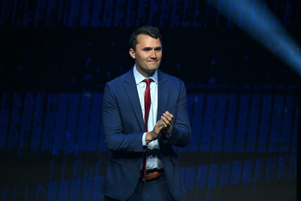 Political activist and founder of Turning Point Action Charlie Kirk takes the stage during a campaign rally for then-presidential candidate Donald Trump in Las Vegas on October 24, 2024. (Photo by Patrick T. Fallon/AFP via Getty Images)
