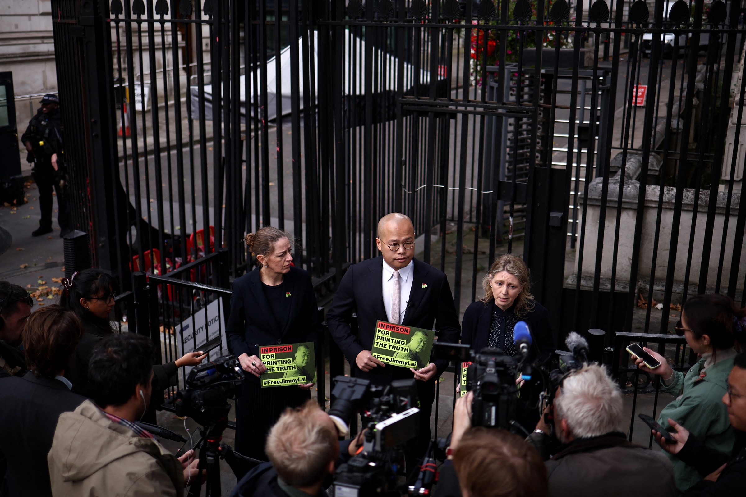 Sebastian Lai, son of Jimmy Lai, looks on during a press conference outside Downing Street in London on September 15, 2025. (Photo by HENRY NICHOLLS/AFP via Getty Images)
