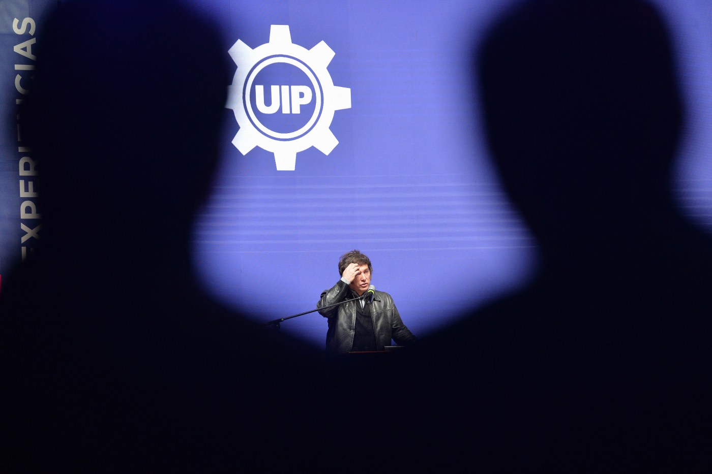 Argentina’s President Javier Milei gives a speech during a meeting with young people from the Industrial Entrepreneurs Forum of Paraguay (FEIP) organized by the Paraguayan Industrial Union (UIP) at the headquarters of the National Secretary of Sports in Asuncion on September 16, 2025. (Photo by Daniel DUARTE / AFP) (Photo by DANIEL DUARTE/AFP via Getty Images)