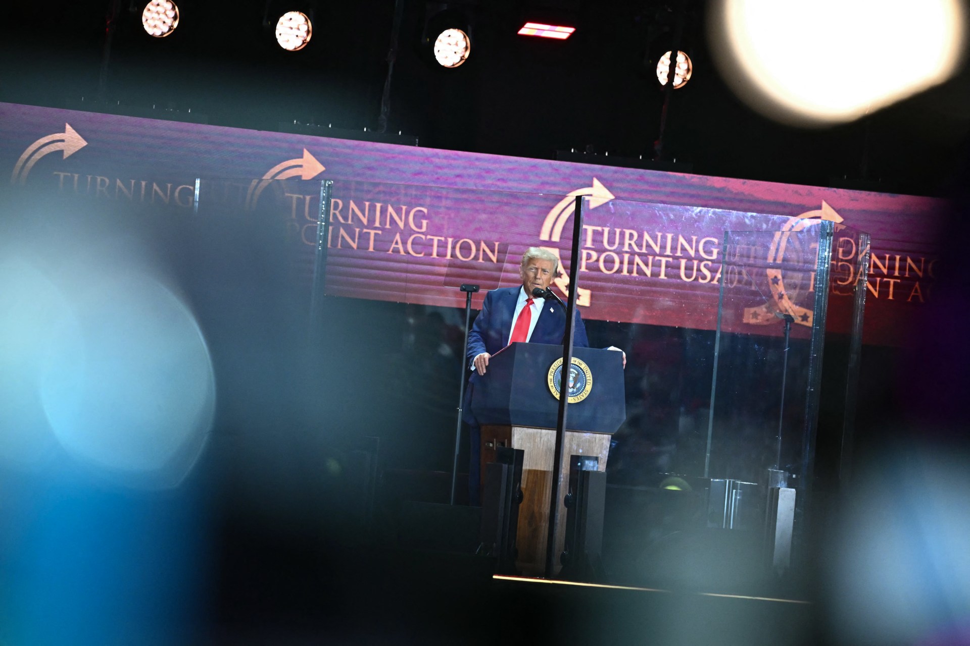 President Donald Trump speaks at the public memorial service for  Charlie Kirk in Glendale, Arizona, on September 21, 2025. (Photo by Mandel Ngan/AFP via Getty Images)