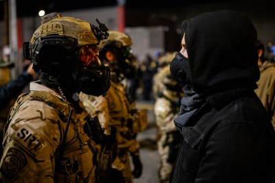 A group of people wearing masks