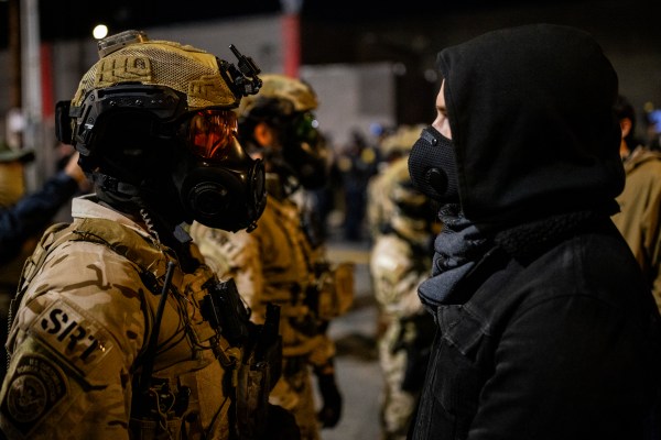 A group of people wearing masks