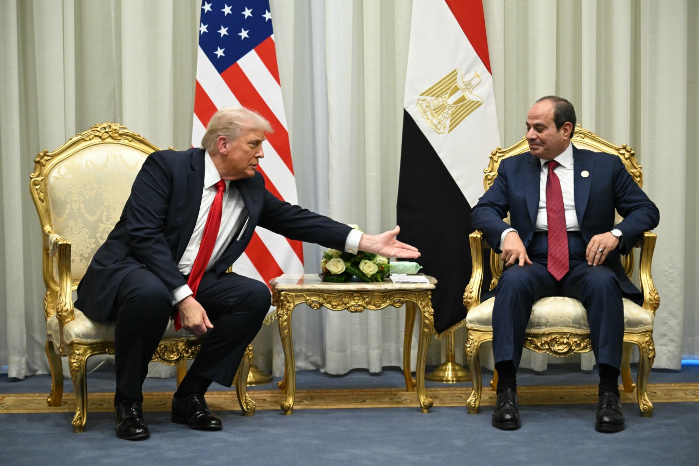 Two men sitting in chairs