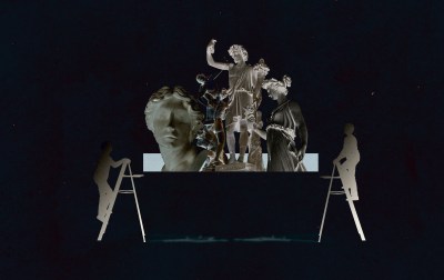 A group of statues on a ladder