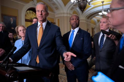 A group of men in suits