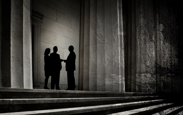 A group of people standing on steps