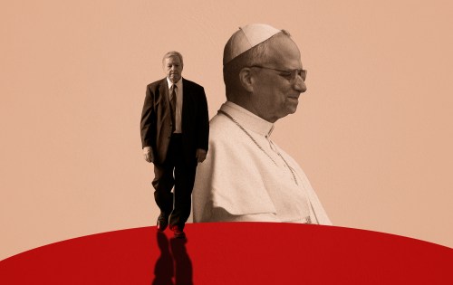 A man walking next to a man in a suit