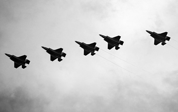 A group of fighter jets flying in the sky