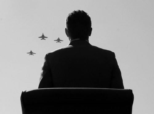 Secretary of Defense Pete Hegseth stands for a “missing man” formation flyover of the U.S. Navy VFA-106 “Gladiators” during the Department of War 2025 National Prisoner of POW/MIA Recognition Day ceremony at the Pentagon on September 19, 2025 in Arlington, Virginia. (Photo by Kevin Dietsch/Getty Images)