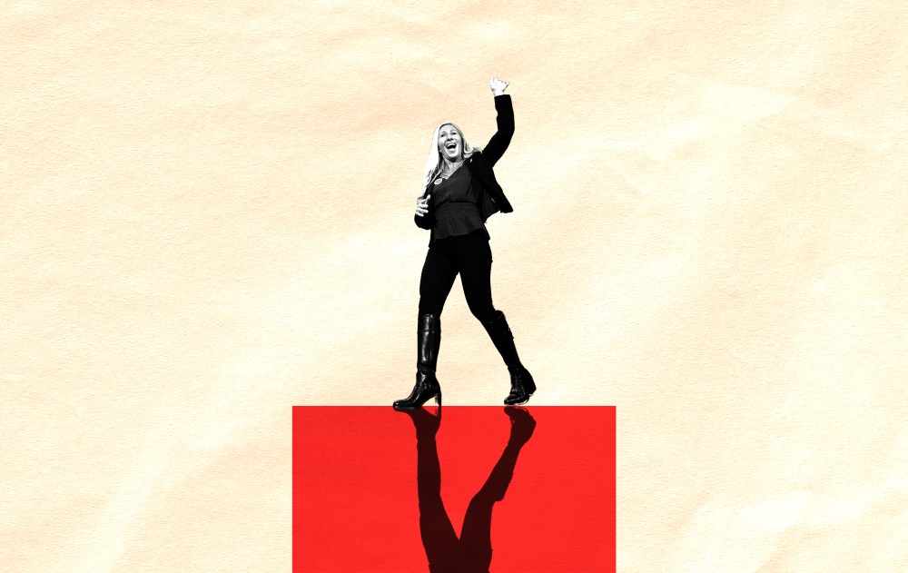 A woman standing on a red square