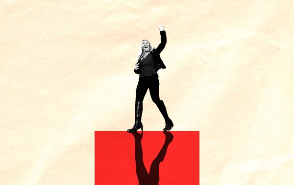 A woman standing on a red square