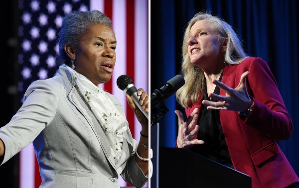 A woman speaking into a microphone