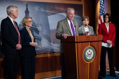 Sen. Tim Kaine speaks at a press conference with other Senate Democrats who voted to restore government funding. (Photo by Nathan Posner/Anadolu via Getty Images)