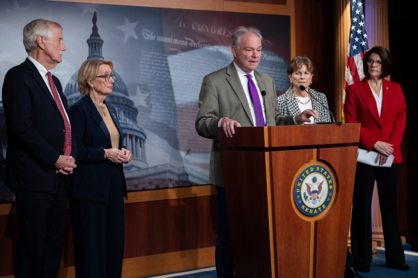 Sen. Tim Kaine speaks at a press conference with other Senate Democrats who voted to restore government funding. (Photo by Nathan Posner/Anadolu via Getty Images)