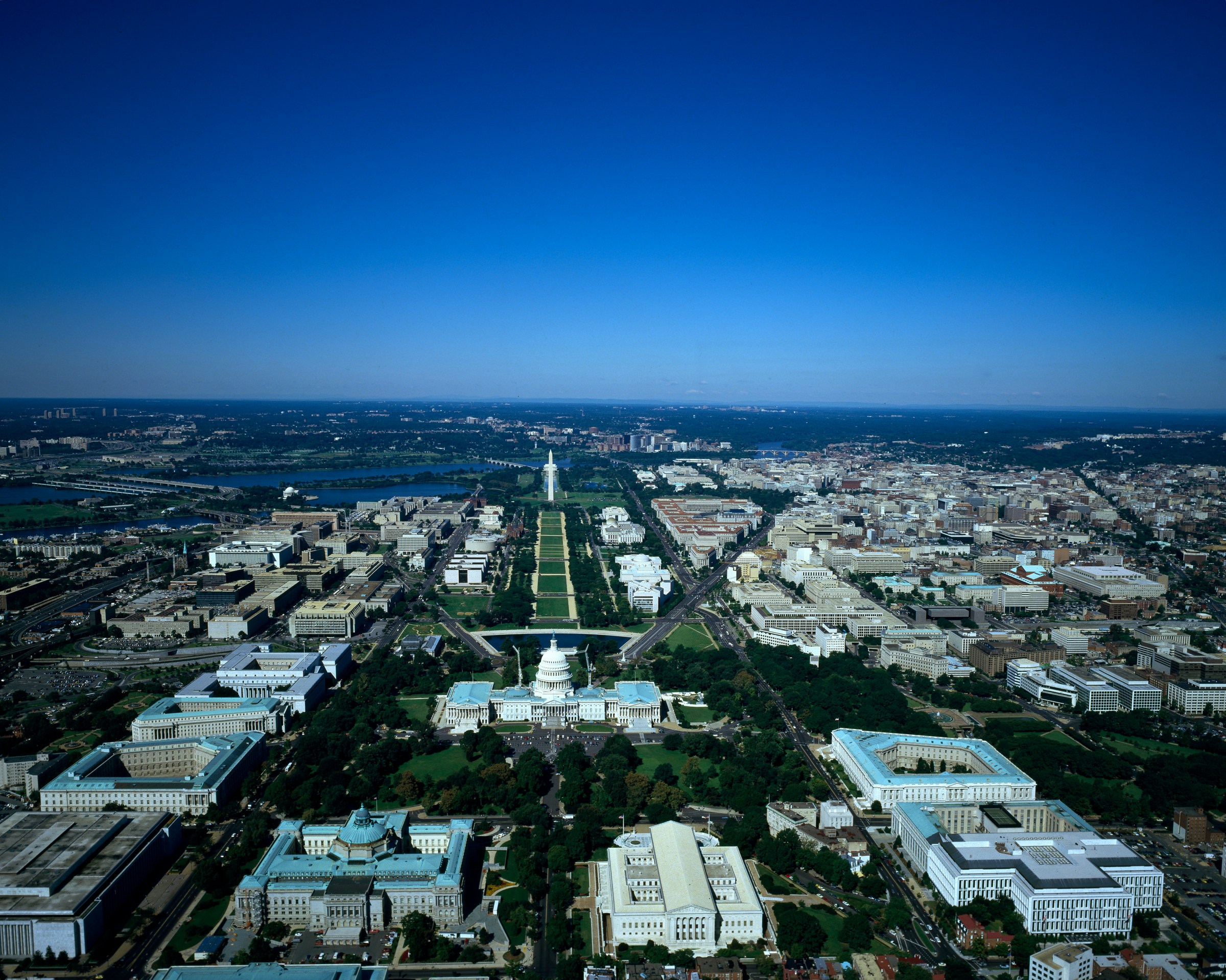 Aerial view of National Mall, with the U.S. Capitol in the foreground and Washington Monument in the