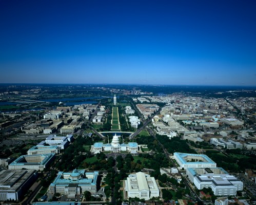 Aerial view of National Mall, with the U.S. Capitol in the foreground and Washington Monument in the