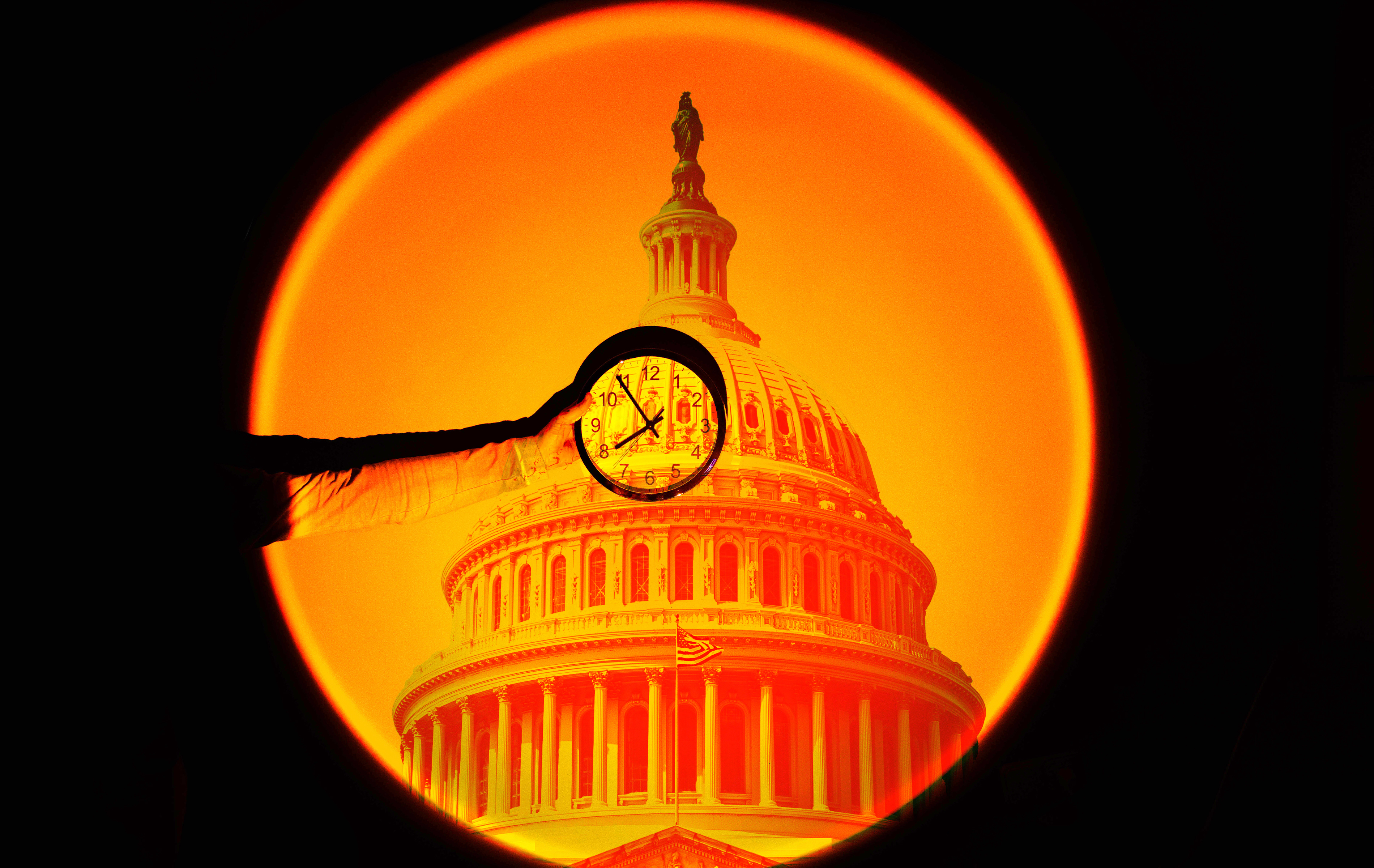 A hand holding a clock