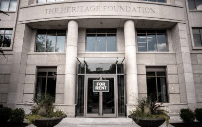 A building with a sign on the door